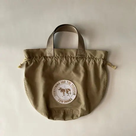 COW BOOKS /Drawstring bag - Khaki